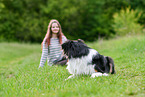 Frau mit Australian Shepherd