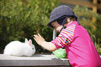 Kind mit Kaninchen