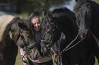Frau und 3 Pferde