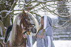 Frau mit Irish Tinker im Winter