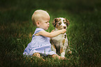 Australian Shepherd mit Kind