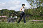 Jogger mit Bearded Collie