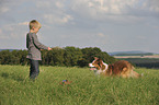 Junge und Border Collie