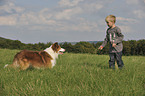 Junge und Border Collie