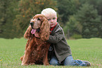 Junge und Cocker Spaniel