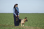 Frau mit Deutschem Schferhund