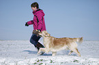 Mdchen und Golden Retriever