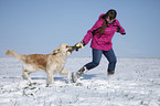 Mdchen und Golden Retriever