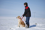 Mdchen und Golden Retriever