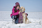 Mdchen und Golden Retriever