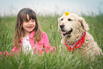 Mdchen und Golden Retriever