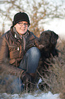 Frau und Labradoodle