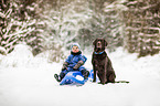 Junge und Labrador Retriever