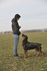 Frau und Rottweiler