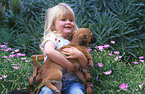 Mdchen mit Welpen