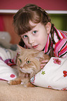 Mdchen mit Sibirischer Katze
