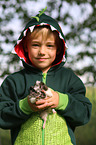 Junge und Meerschwein