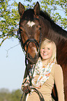 Frau mit Bayerischem Warmblut