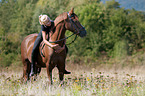 Deutsches Reitpony mit Frau