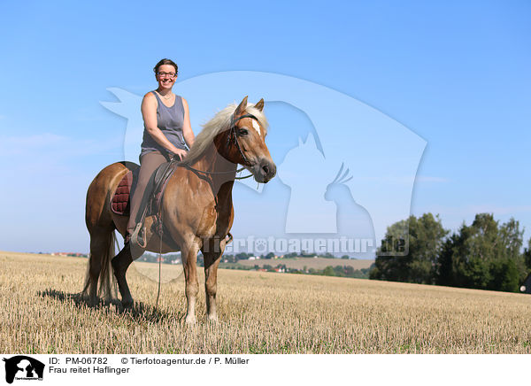 Frau reitet Haflinger / woman rides Haflinger Horse / PM-06782