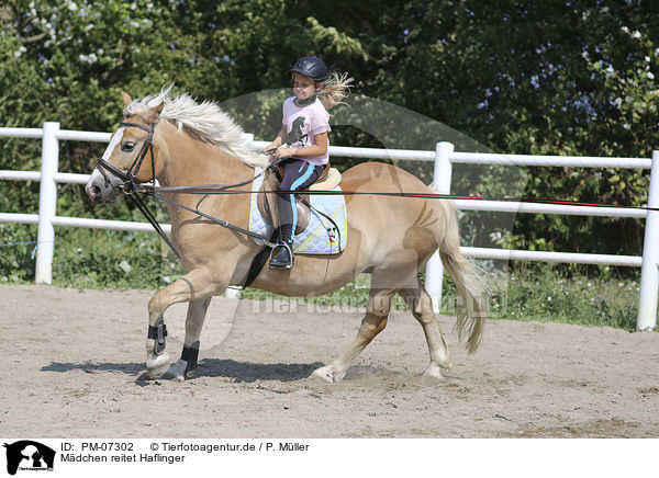 Mdchen reitet Haflinger / girl rides Haflinger / PM-07302