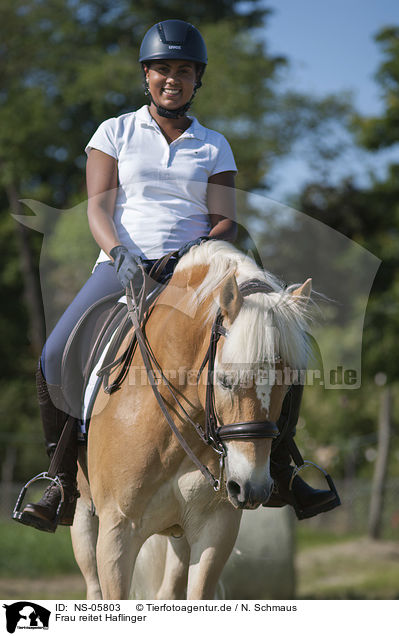 Frau reitet Haflinger / woman rides Haflinger / NS-05803