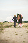 Frau mit Trakehner