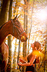 Frau und Warmblut