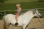 Junge und Pony