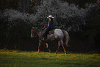 junges Mdchen reitet auf Appaloosa